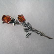 Broche rose double